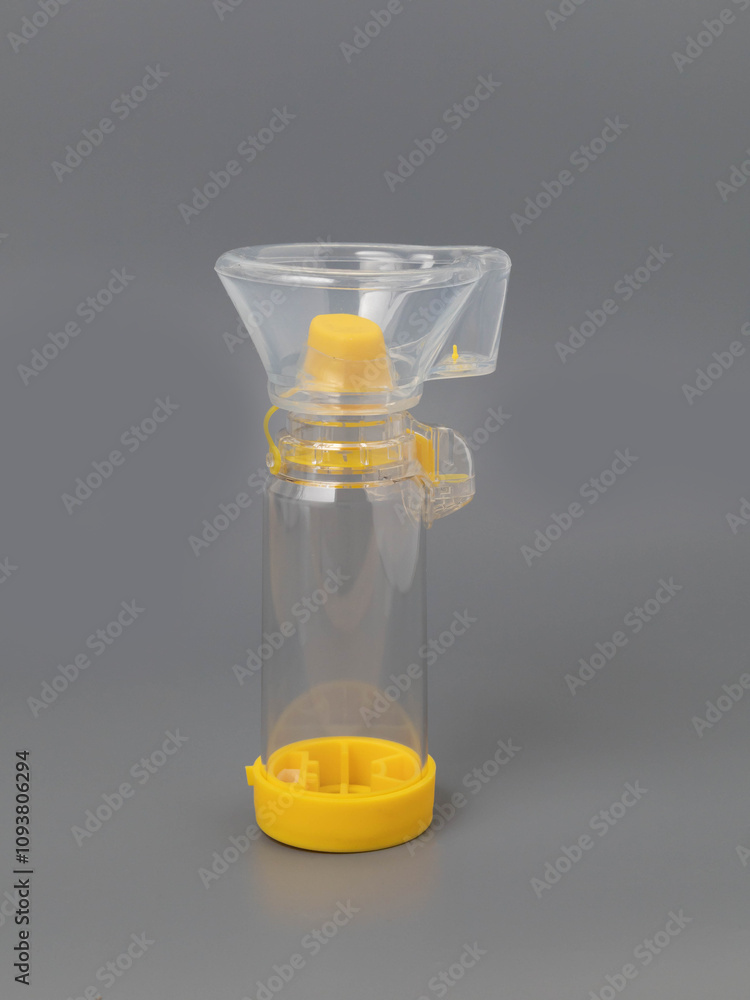 Breast pump bottles on a gray background Breast pump bottles on a gray background