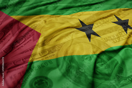 waving colorful flag of sao tome and principe on the dollar money background. finance concept.