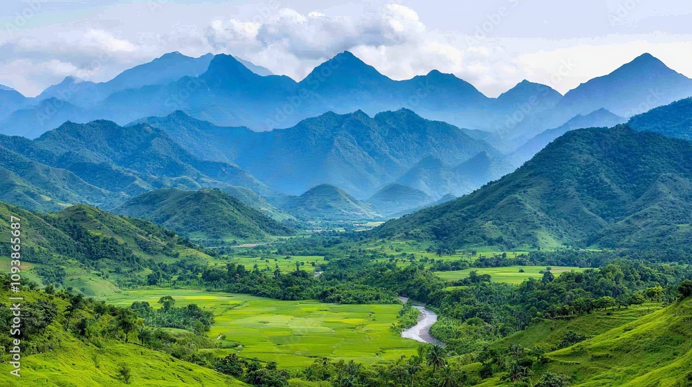 Panoramic view of lush green valley nestled between majestic blue mountains, a tranquil river meandering through the landscape. Panoramic view of lush green valley nestled between majestic blue mountains, a tranquil river meandering through the landscape.
