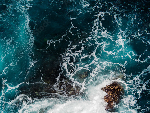Wallpaper Mural aerial of dark ocean waves crashing against the rocks creating whitewash  Torontodigital.ca