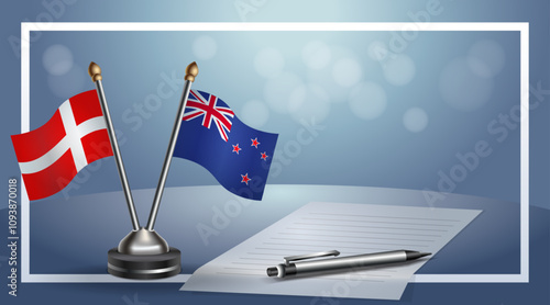 Denmark and New Zealand National flags on small table with bokeh background, cooperative relationship