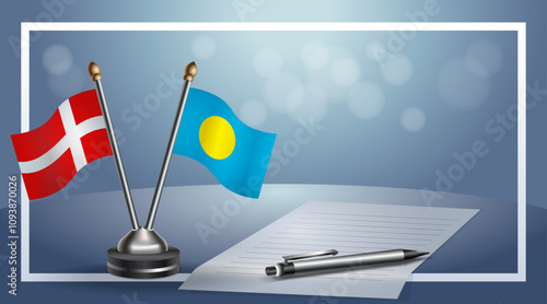 Denmark and Palau National flags on small table with bokeh background, cooperative relationship