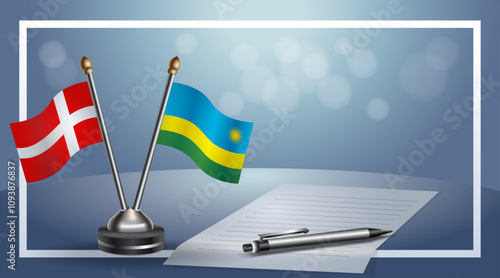 Denmark and Rwanda National flags on small table with bokeh background, cooperative relationship