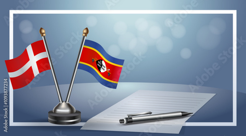 Denmark and Swaziland National flags on small table with bokeh background, cooperative relationship