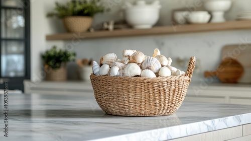 A spacious beach house kitchen island with marble countertops
