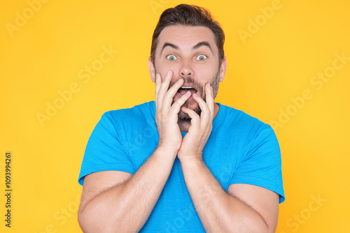 Studio isolated portrait of middle aged man with surprise facial expression. Man Hispanic man worried and nervous, concerned and surprised expression. Fear and excited male face. Amazement concept.