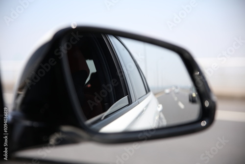 Rearview mirror of a moving car