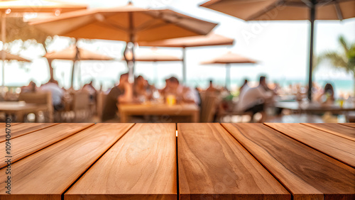 Wallpaper Mural Empty wooden table top with blurred restaurant near the beach background Torontodigital.ca