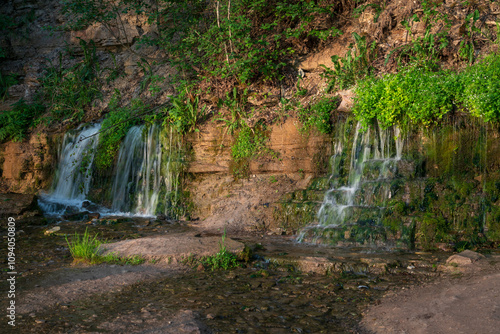 View of the Slovenian Streams (Streams of the Twelve Apostles) in the Izborsko-Malskaya Valley on a sunny summer morning, Izborsk, Pechersk district, Pskov region, Russia photo