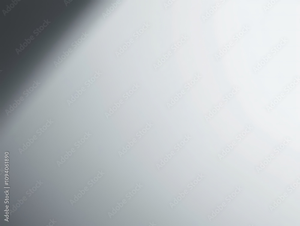 A smooth gradient of light and shadow creates a serene and minimalist atmosphere. A smooth gradient of light and shadow creates a serene and minimalist atmosphere.
