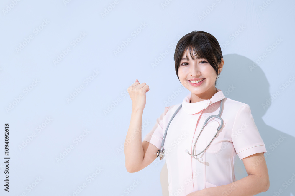 Closeup of nurse posing with guts, looking at camera, light blue background Closeup of nurse posing with guts, looking at camera, light blue background