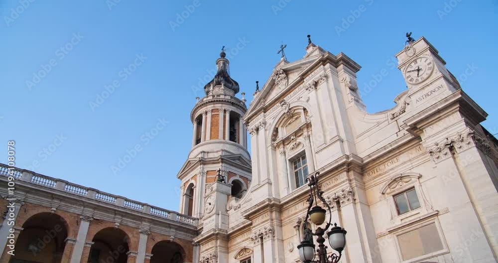 Low-angle cinematic view of the facade of the Pontifical Sanctuary of the Holy House of Loreto. Low-angle cinematic view of the facade of the Pontifical Sanctuary of the Holy House of Loreto.