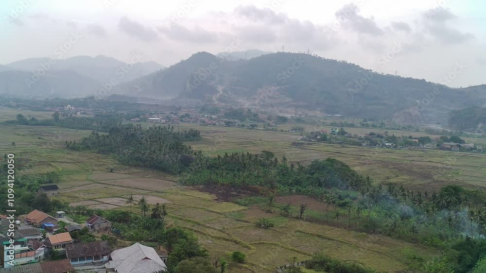 Panoramic Mountain View from the Top with Green Hills and Cloudy Sky Panoramic Mountain View from the Top with Green Hills and Cloudy Sky