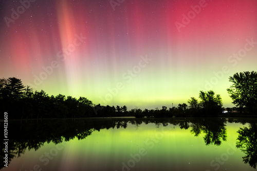 Aurora Borealis reflecting over a lake