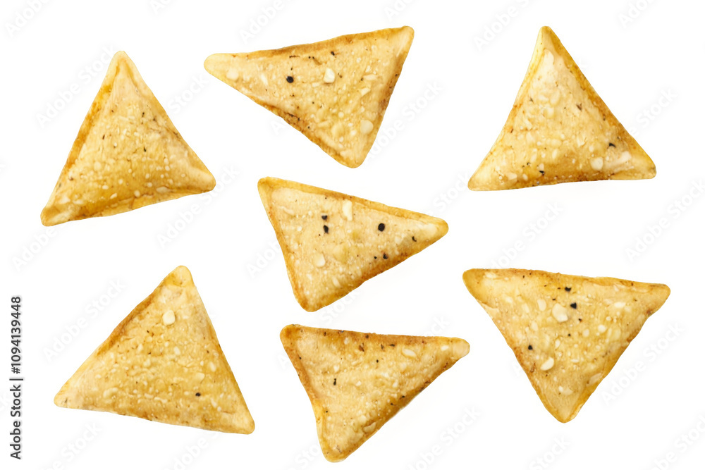 Six triangular-shaped tortilla chips arranged scattered manner black Nachos set cut Six triangular-shaped tortilla chips arranged scattered manner black Nachos set cut