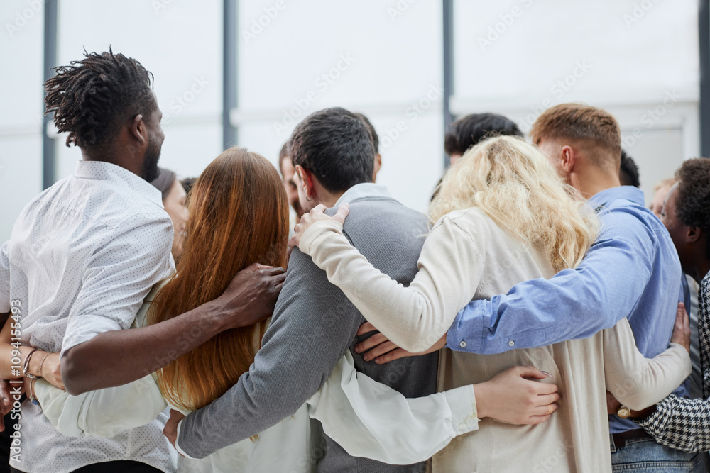 Group of happy positive smiling multiethnic men and women from different mixed race countries standing in a circle Group of happy positive smiling multiethnic men and women from different mixed race countries standing in a circle