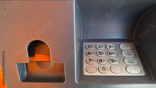 receipt ejection slot and keypad number on ATM photo