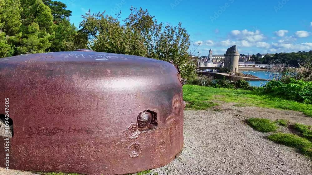 Historic military bunker with Solidor tower in background, Saint-Malo, Brittany in France Historic military bunker with Solidor tower in background, Saint-Malo, Brittany in France