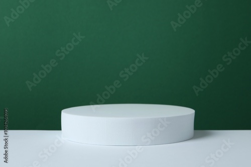 White podium on color background 