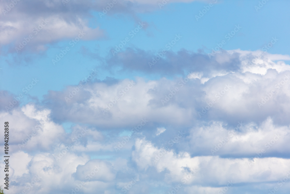 White clouds against a blue sky White clouds against a blue sky