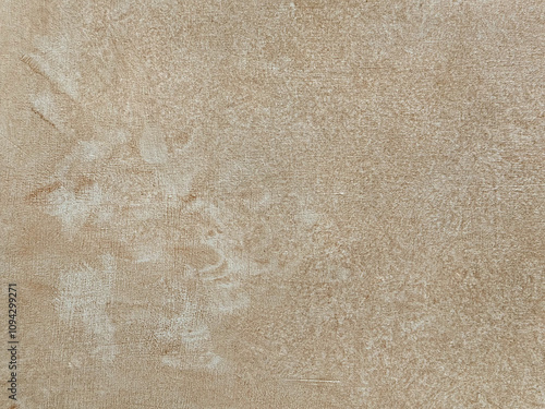 Washed cement screed in beige and cream color, random abstract pattern washed ripple textured paint seamless background.