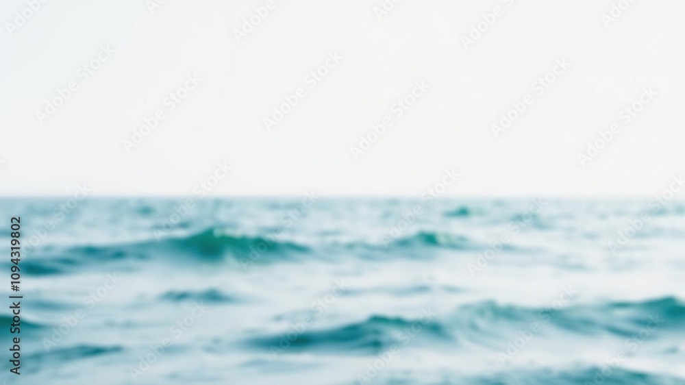 Blurry teal waves on a distant horizon line against a soft white sky, soft focus, blurred edges Blurry teal waves on a distant horizon line against a soft white sky, soft focus, blurred edges