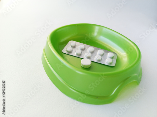 Tablets in a bowl for dogs, cats. Diabetes in dogs. Antiparasitic tablet for horses. Veterinary pharmacy. Gastrointestinal diseases in dogs.
