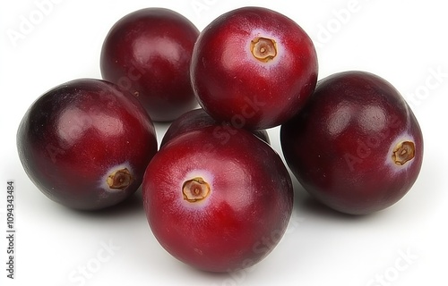 A cluster of shiny, dark red grapes arranged on a white background.