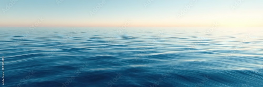 Fototapeta premium A vast expanse of blue water meeting the horizon at a soft creamy line where waves gently rock the surface with a soothing quality, natural, gentle