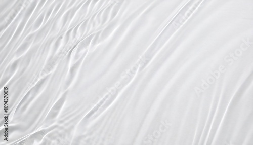 Wallpaper Mural Subtle undulations disrupting the calm of a clear water surface, forming captivating interplays of light and darkness Torontodigital.ca