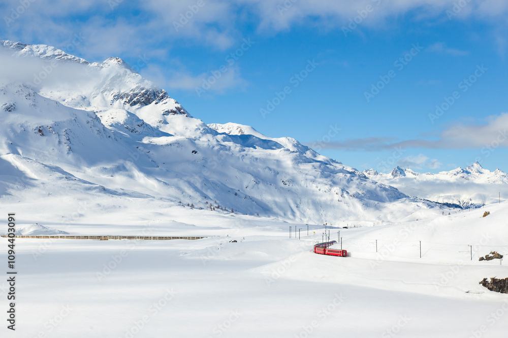Red Express in the Winter Season Photo, Lake Bianco Pontresina, Switzerland Red Express in the Winter Season Photo, Lake Bianco Pontresina, Switzerland