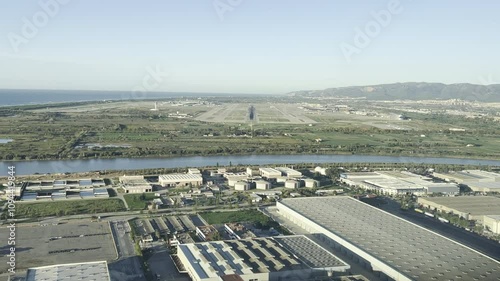 Pilots FPV in a real time approach to Barcelona airport runway as seen by the pilots from the cockpit in a summer day with the early morning light. 4K photo