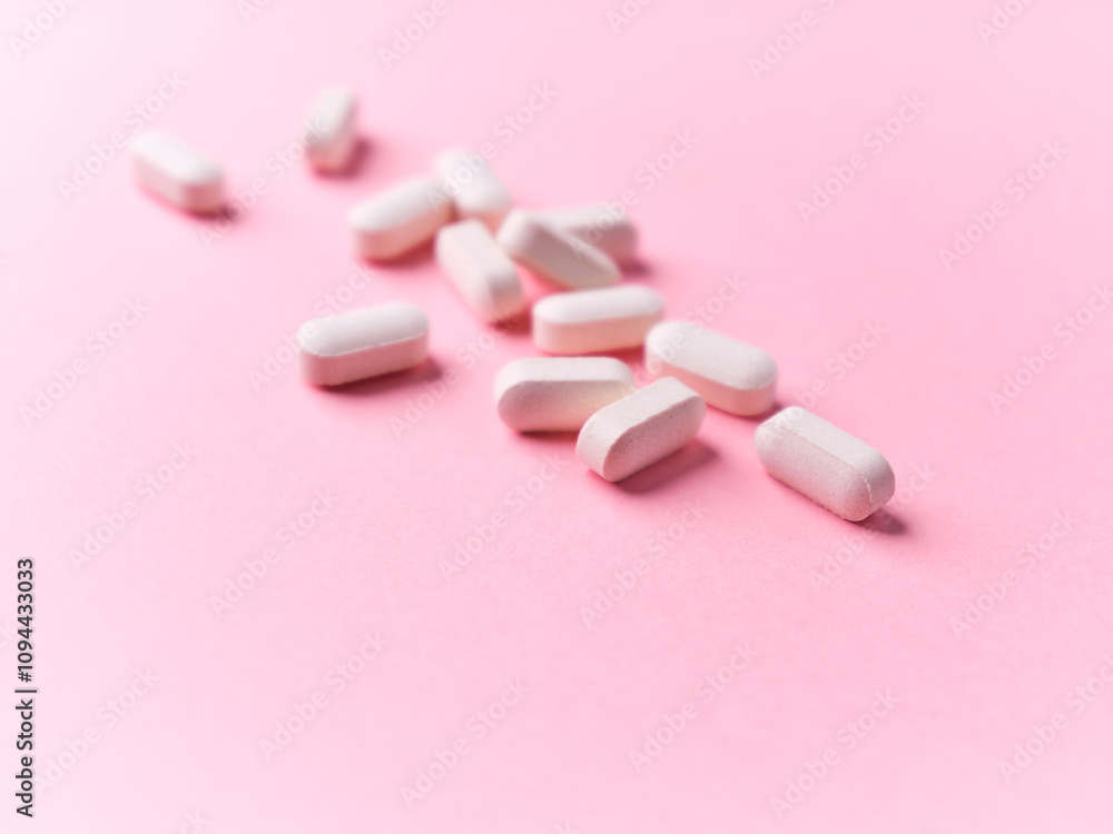 Glucosamine and Chondroitin Tablets. Supplements to support collagen production. Bright paper background. Soft focus. Close up. Copy space. Glucosamine and Chondroitin Tablets. Supplements to support collagen production. Bright paper background. Soft focus. Close up. Copy space.