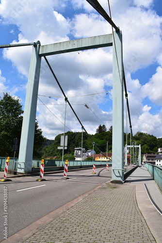 Alte Saarbrücke, suspension bridge in Mettlach with repairs and lane closure photo