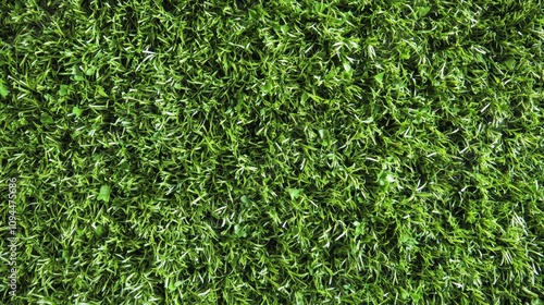 A close-up view of lush green artificial grass, showcasing its texture and vibrant color.