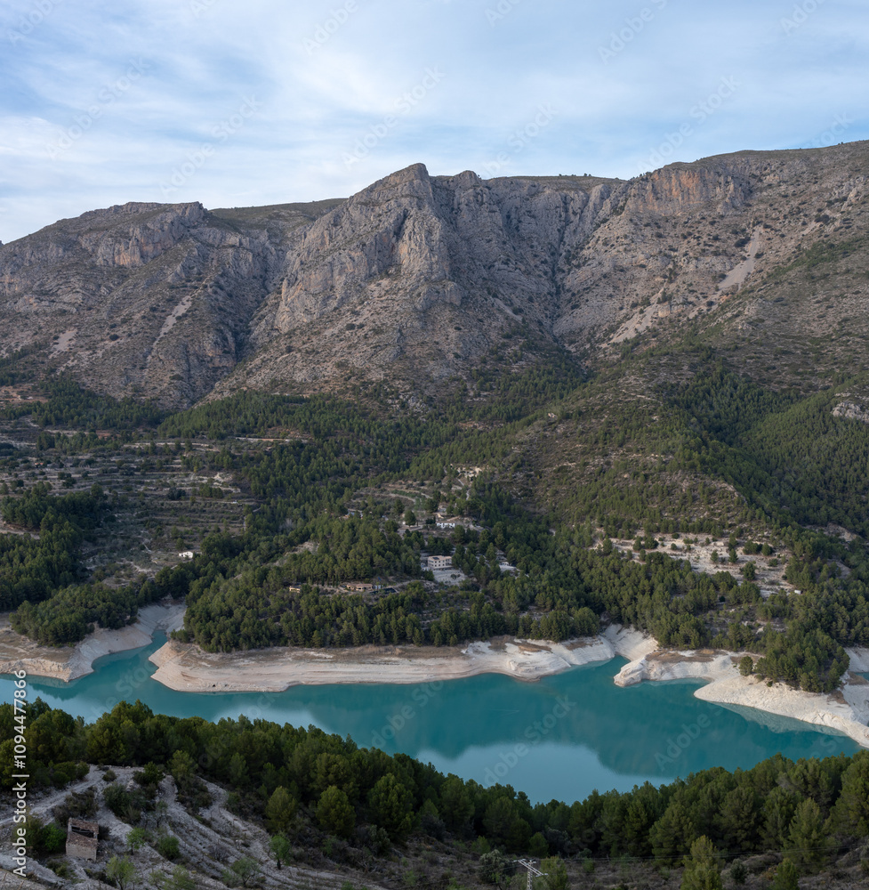 View of a clear blue water lake in square format. Guadalest (Alicante) at the spanish mediterranean coast View of a clear blue water lake in square format. Guadalest (Alicante) at the spanish mediterranean coast