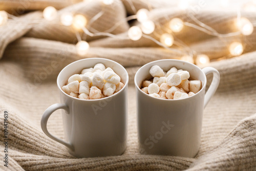 Cups of delicious hot chocolate and artisanal gift box