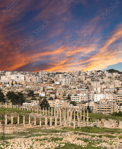 Roman ruins (against the background of a beautiful sky with clouds) in the Jordanian city of Jerash (Gerasa of Antiquity), capital and largest city of Jerash Governorate, Jordan #1094497683