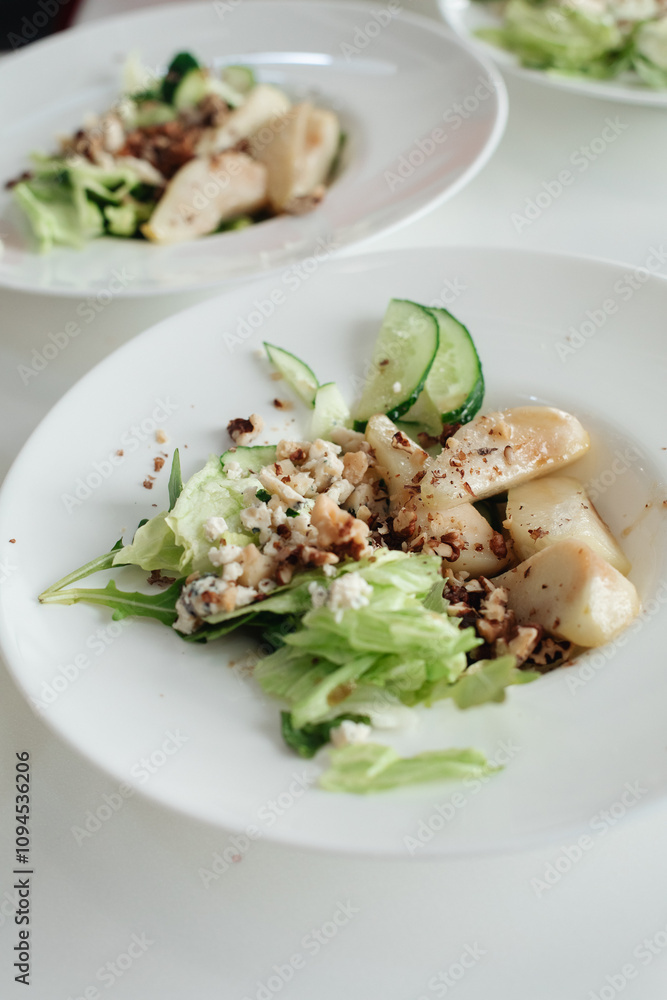Salad with blue cheese, pears, nuts, chard and arugula Salad with blue cheese, pears, nuts, chard and arugula