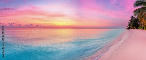Beautiful sunset over tranquil ocean with pastel colors and serene beach land...