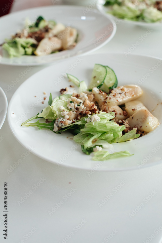 Salad with blue cheese, pears, nuts, chard and arugula Salad with blue cheese, pears, nuts, chard and arugula