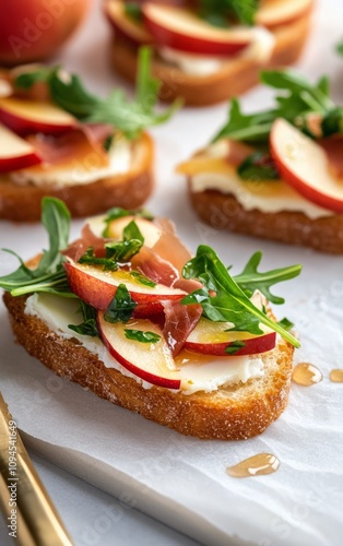 Delicious apple and arugula toast with ham on crisp bread for a healthy snack...