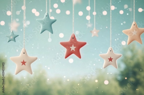 Decorative hanging stars in red, white, and blue against a soft background