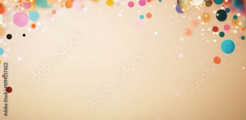 Colorful balloons and confetti arranged on a soft pastel background for a fes...