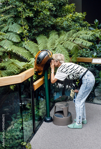 Vistor at the natural museum in Alburquerque. New Mexico USA. Slide reproduction from 1984.New Mexico USA.  photo