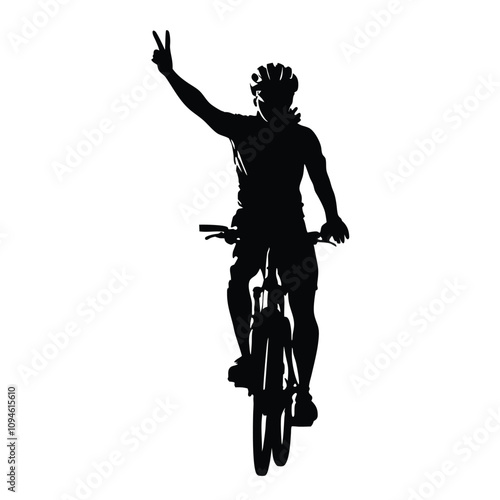 A man is riding a bicycle and is holding up his right hand. He is also holding up his left hand
