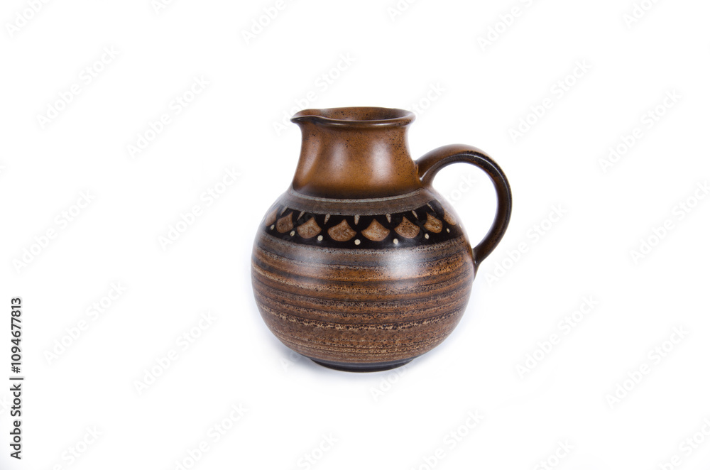old antique jug on a white background old antique jug on a white background