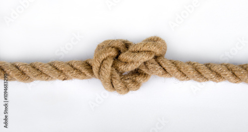 jute rope with knot on white background, thick jute rope,