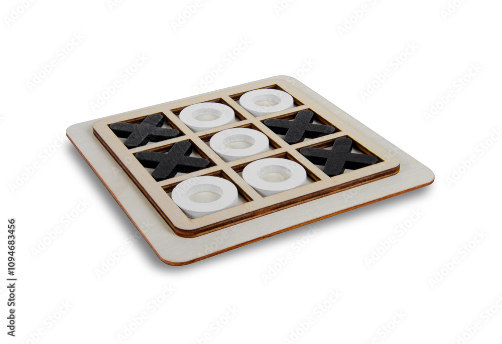 A wooden game set of noughts and crosses on a black background, tic-tac-toe A wooden game set of noughts and crosses on a black background, tic-tac-toe