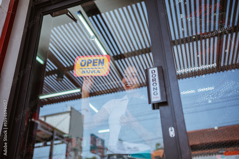 female entrepreneur holding open sign information, starting business female entrepreneur holding open sign information, starting business